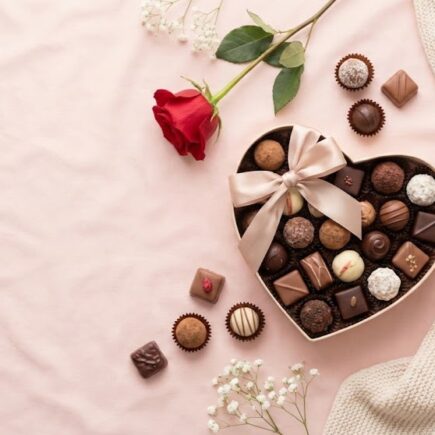 Chocolate Day gift ideas with heart shaped chocolate box and rose